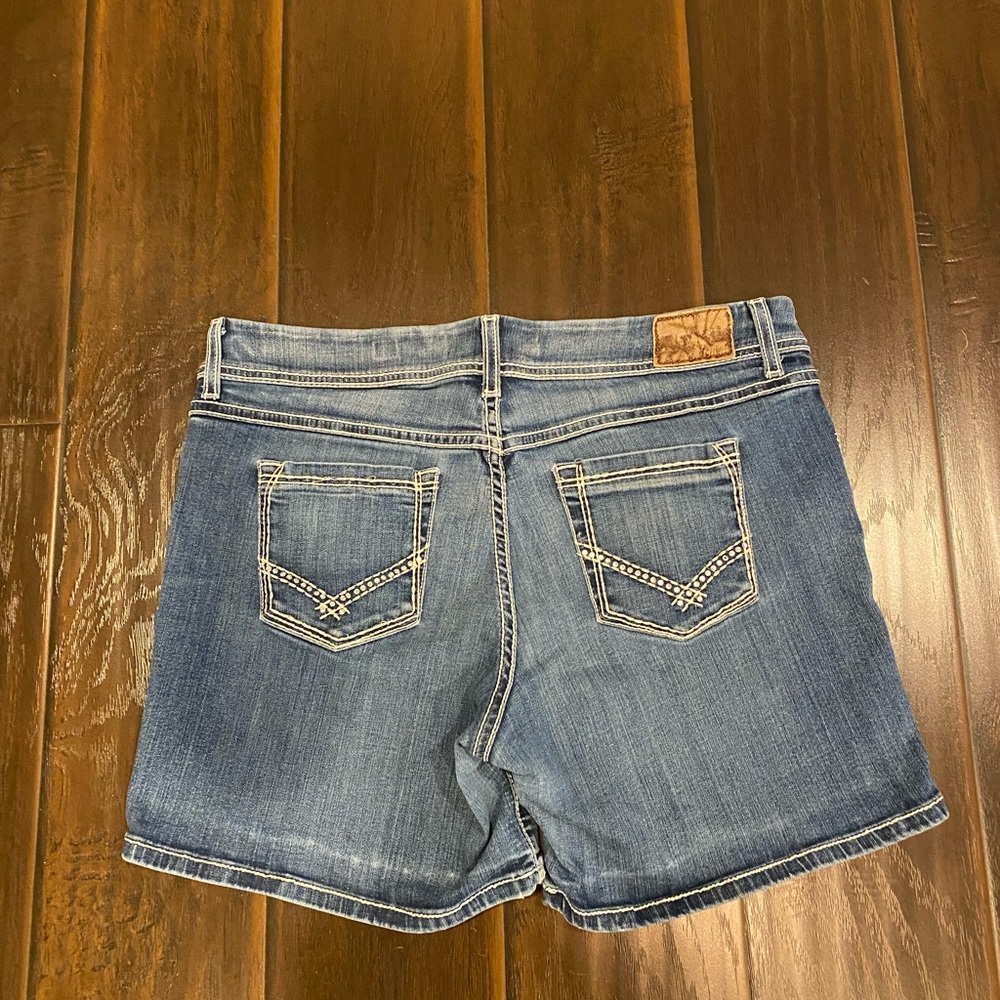 BKE Denim Culture Size 34 with stitching design on sides and bling back pockets